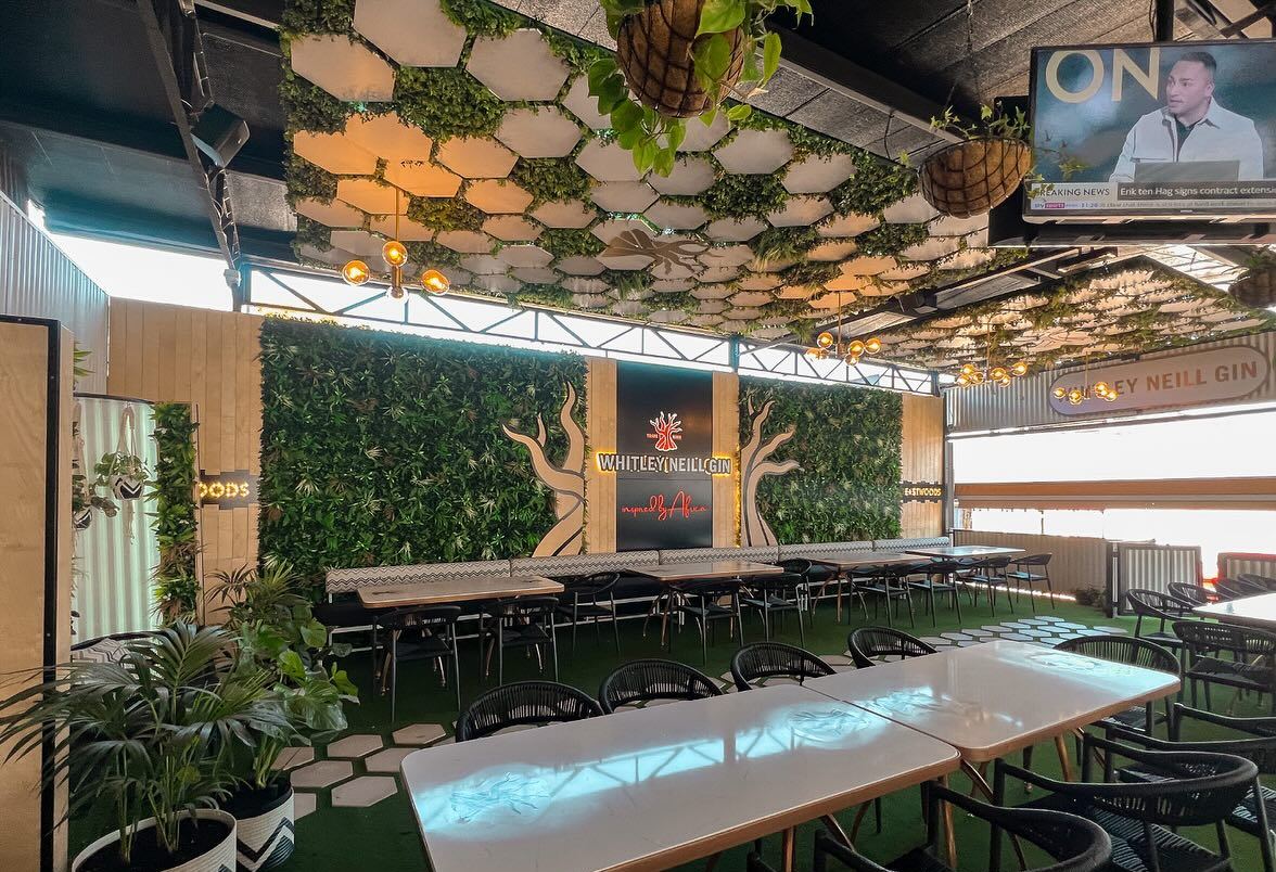 Eastwoods hospitality fit-out with green wall and hex ceiling